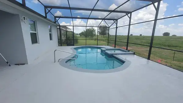 Beautiful freeform pool by Magic Pools Florida
